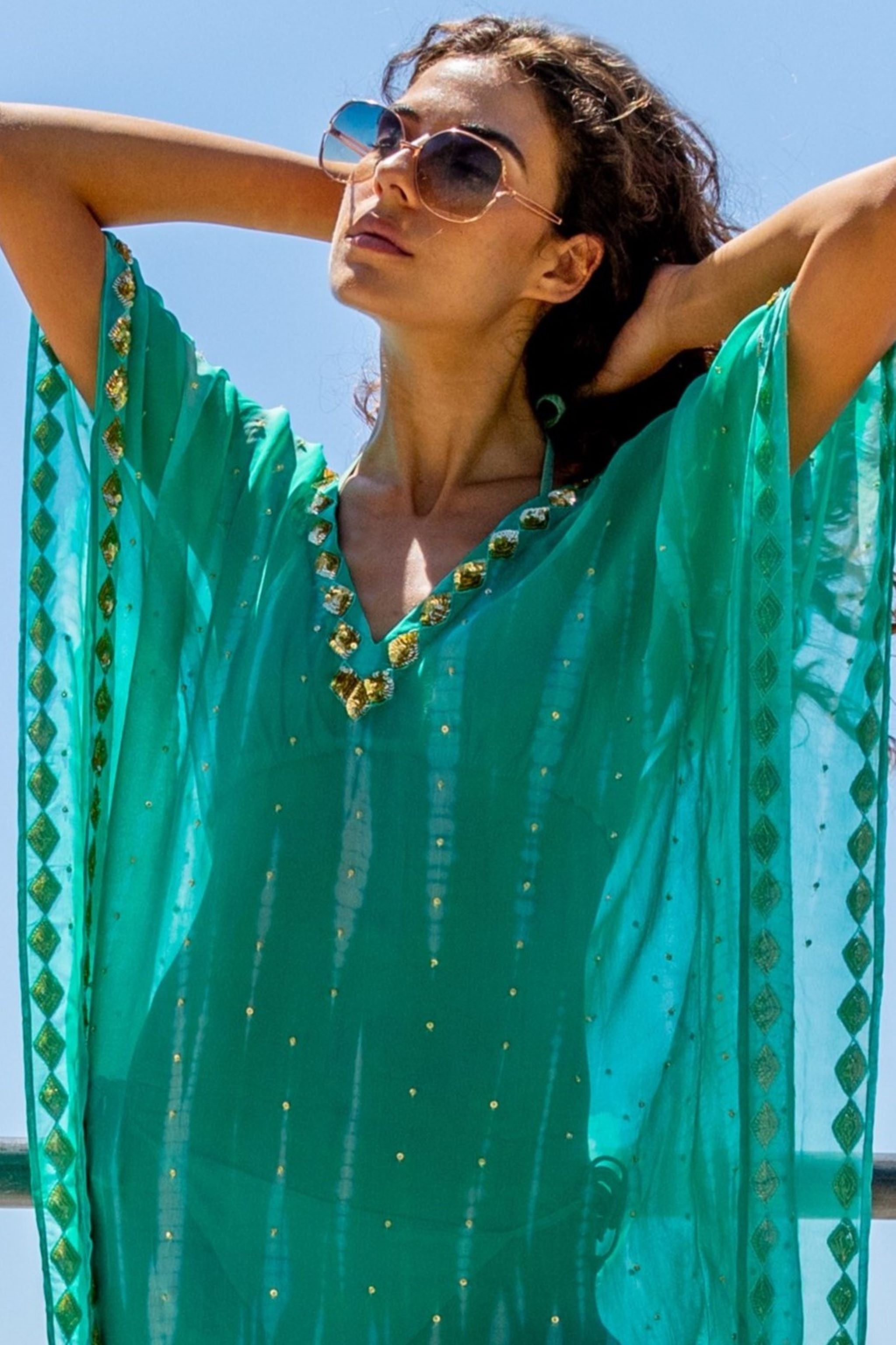 Aqua silk kaftans to wear in the Caribbean by lindsey brown silk resort wear
