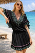 black cotton embroidered beach dresses to wear on holiday by lindsey brown resort wear 