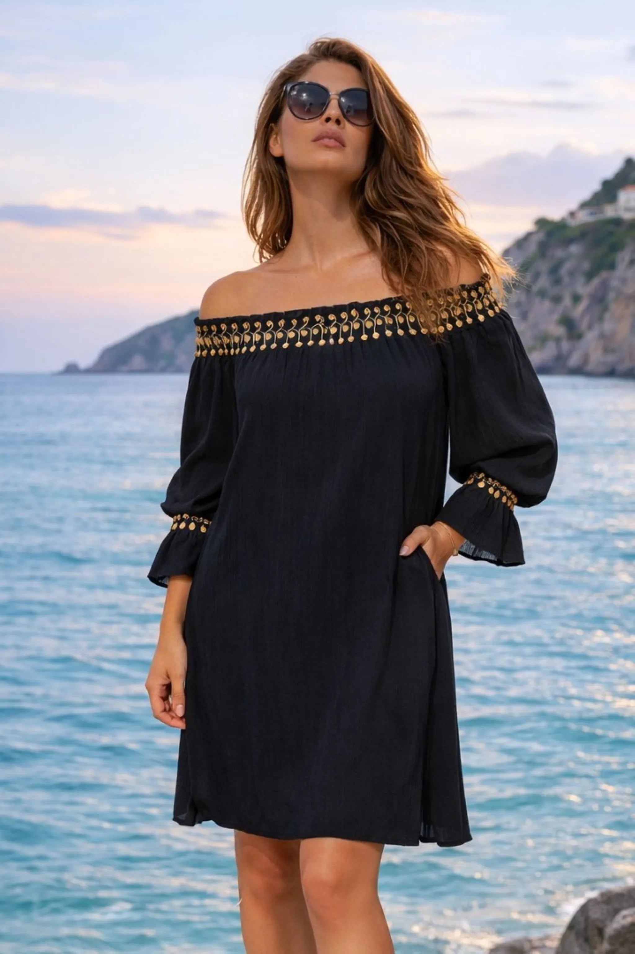 black and gold long sleeved cotton dress to wear on holiday by Lindsey Brown