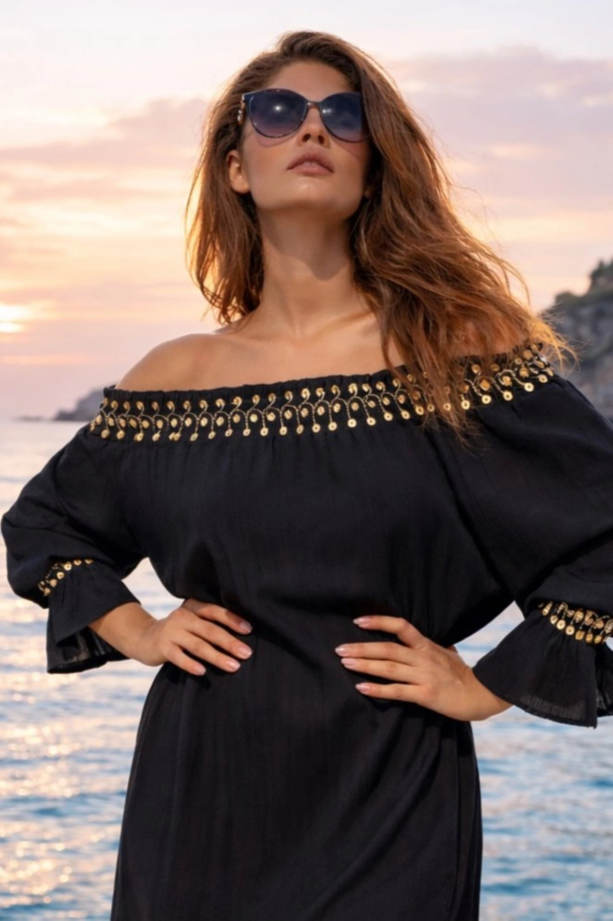 black and gold cotton off the shoulder bardot dress to wear on holiday by Lindsey Brown