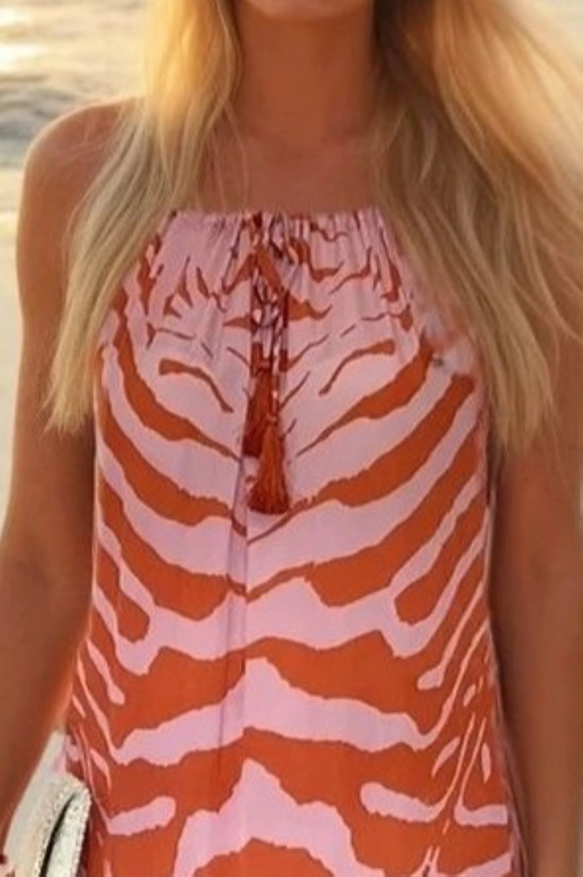 orange and pink floaty sleeveless maxi dress by Lindsey Brown resort wear