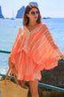 orange silk bloused kaftan dress to wear on vacation by Lindsey Brown luxury resort wear 