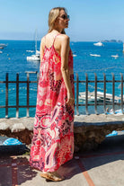 pink floaty maxi dresses to wear on vacation by Lindsey Brown luxury resort wear 
