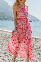 Pink animal print floaty silk resort wear and silk designer dresses to wear on vacation by Lindsey Brown