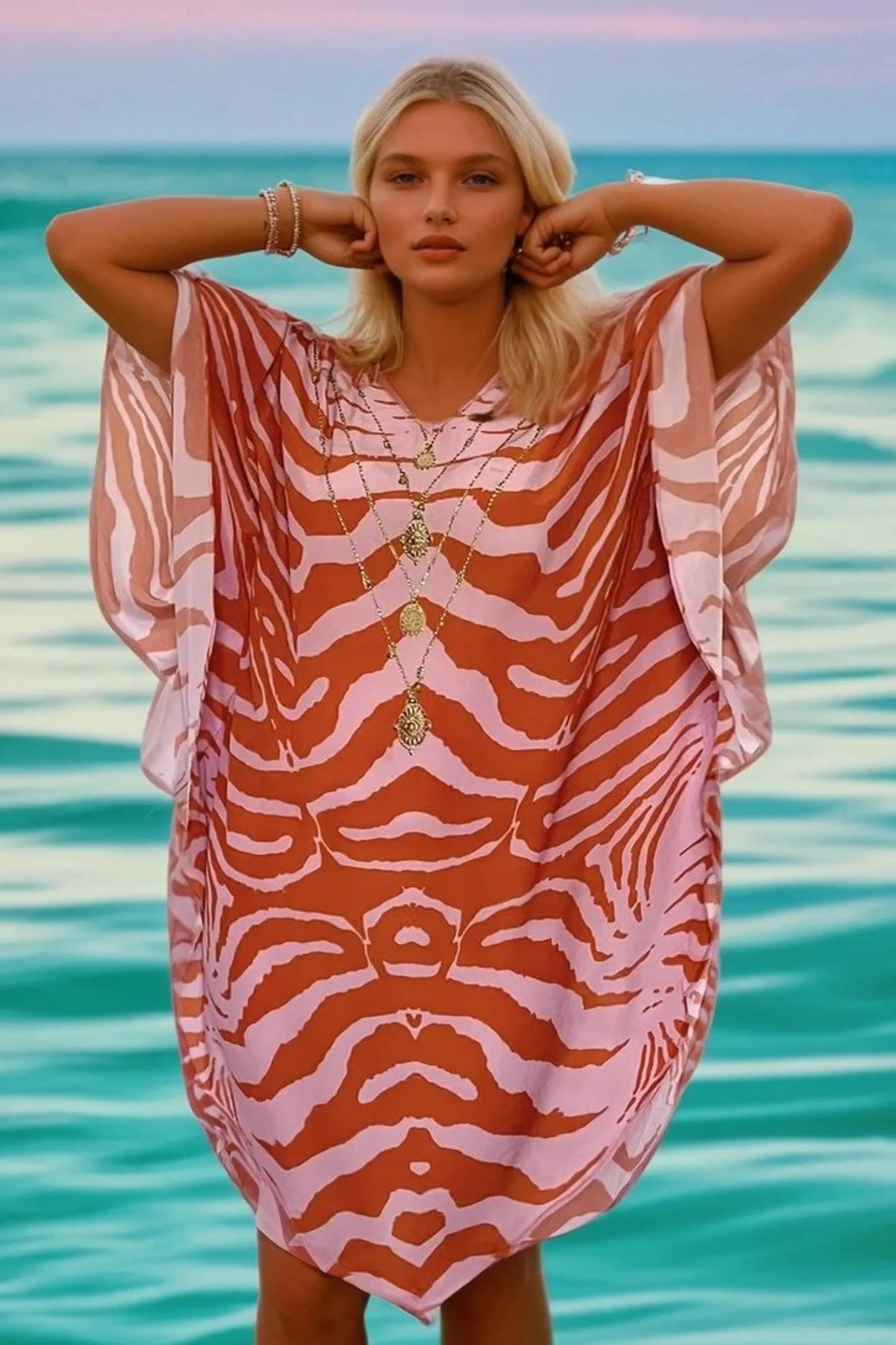 tiger print floaty beach cover up by Lindsey Brown luxury resort wear