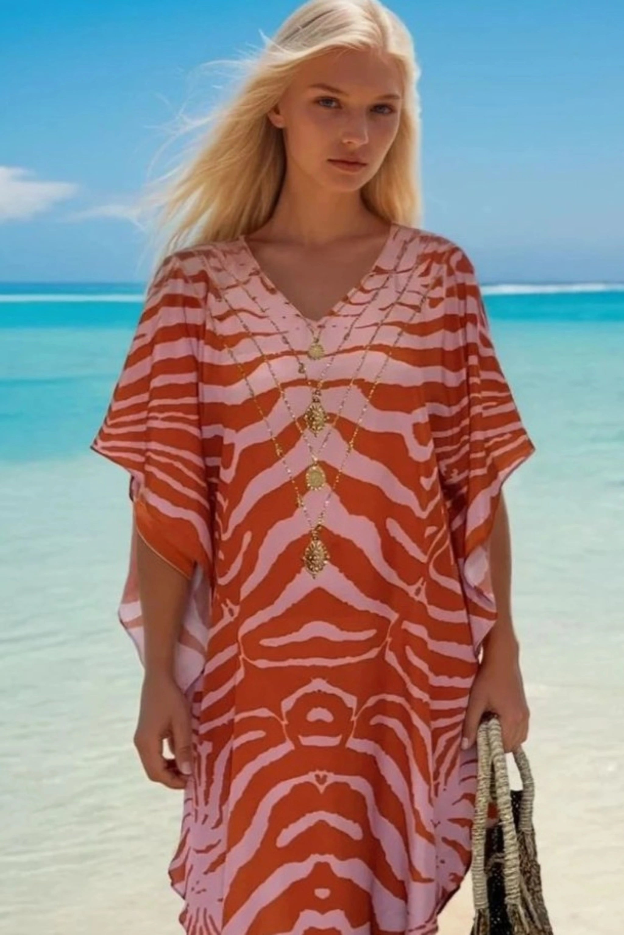 abstract tiger print pink and orange beach coverup by Lindsey Brown