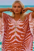 r print pink and orange beach cover up by Lindsey Brown resort wear 