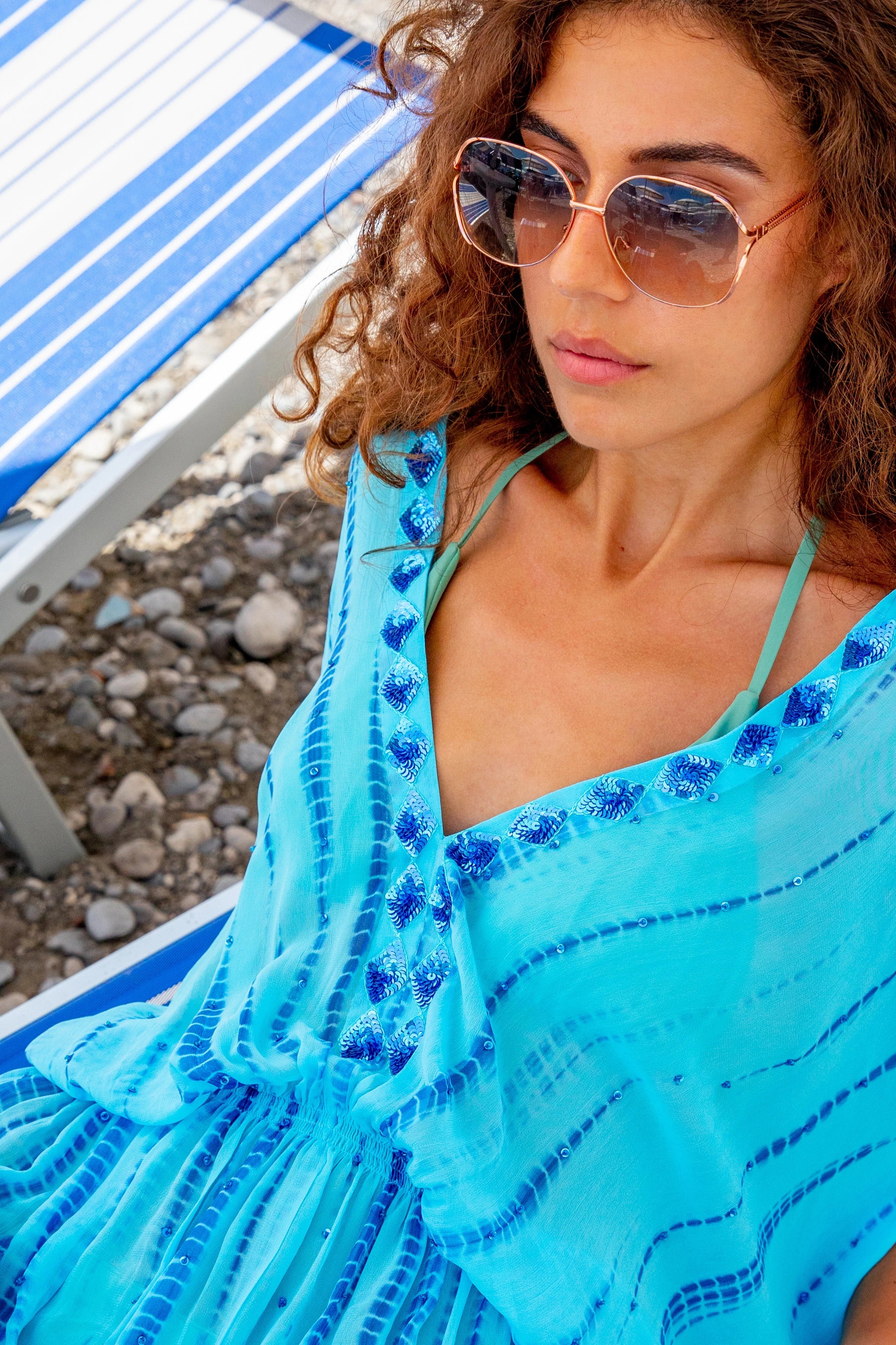 turquoise blue silk tie dye luxury resort wear kaftans by  Lindsey Brown