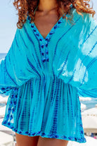 turquoise blue short silk resort wear kaftans by Lindsey Brown
