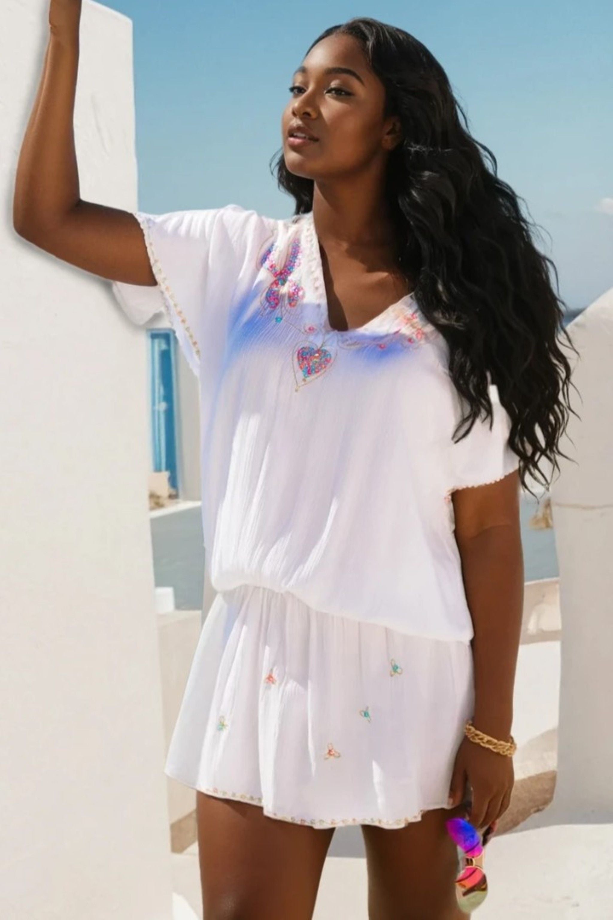 white plus size cotton short beach dress to wear on holiday by Lindsey Brown luxury resort wear