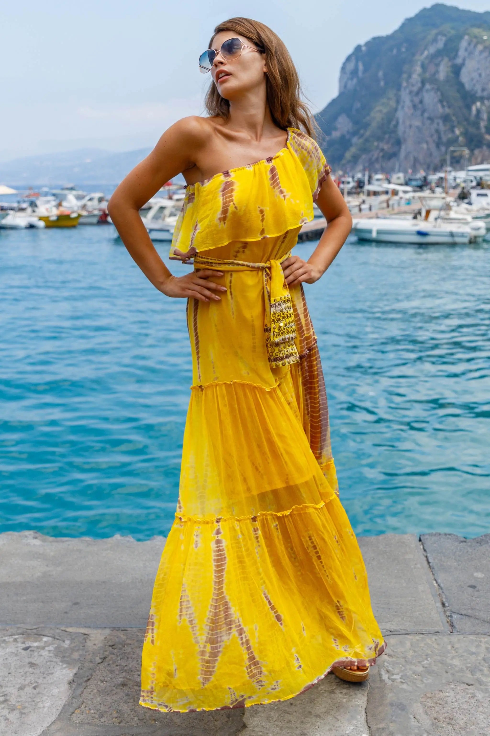 yellow silk maxi dresses to wear on a Caribbean holiday by Lindsey Brown resort wear 